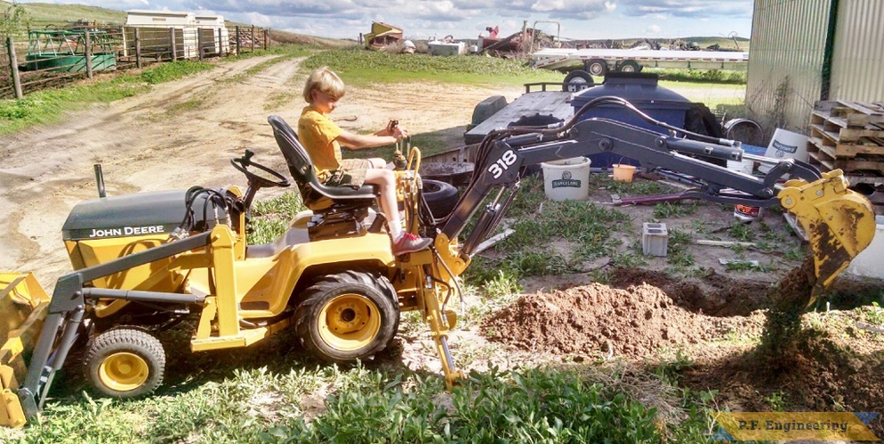 Jake T., John Deere 318 Micro Hoe | John Deere 318 Micro with Bill operating