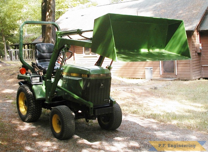 Rae C., Australia John Deere 655 | john deere 655 compact tractor loader bucket dumping