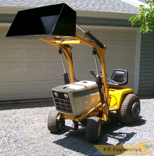 Roger G., Chambersburg, PA Cub Cadet 1872 loader | cub cadet  1872 garden tractor loader raised bucket