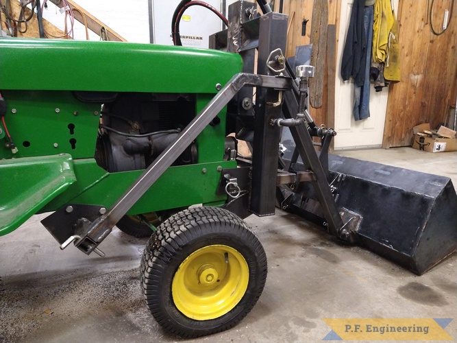 Richard W. from Winchester, ID - John Deere 140 tractor | Richard W. from Winchester ID and his JD 140 with pin on mini payloader view of oil reservoir in the tower