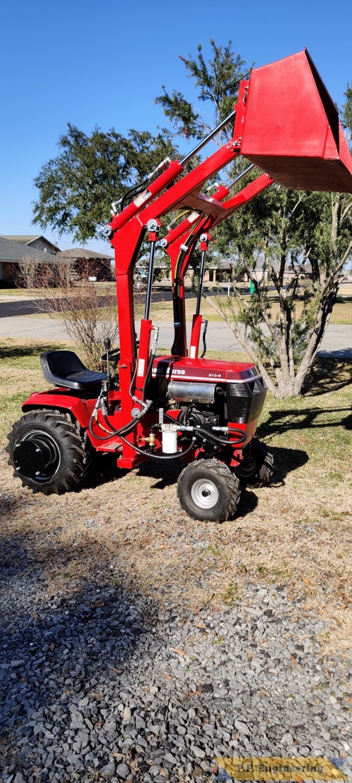 Don A. from Thibodaux, LA and his Wheelhorse 310-8 loader | Don A. and his Wheelhorse 310-8 loader in Thibodaux, LA bucket raised right side