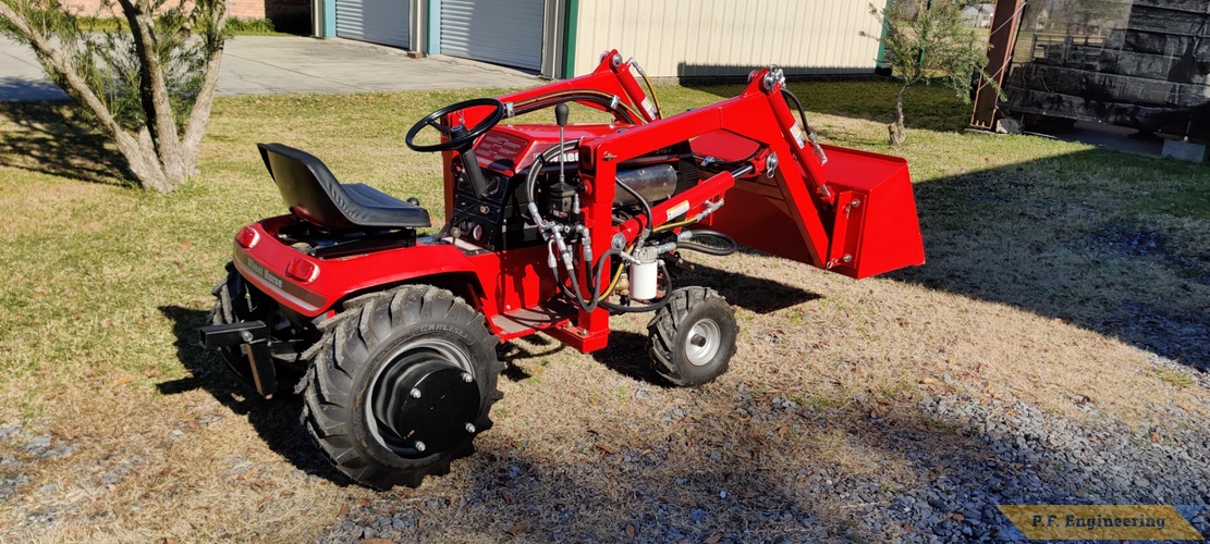 Don A. from Thibodaux, LA and his Wheelhorse 310-8 loader | Don A. and his Wheelhorse 310-8 loader in Thibodaux, LA right side view