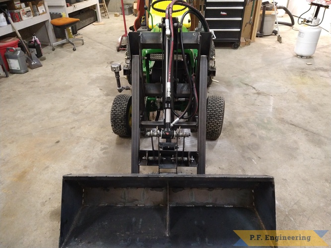 Richard W. from Winchester, ID and his John Deere 140 Pin On loader | Richard W. built this Pin On Loader for his John Deere 140 front view