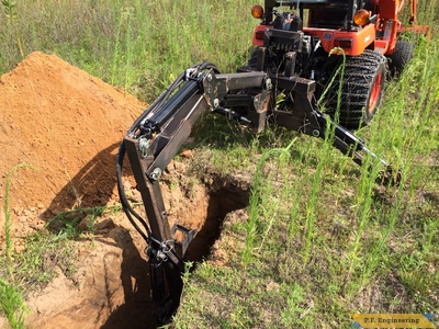 Kubota BX2200 micro hoe digging by Mark J.