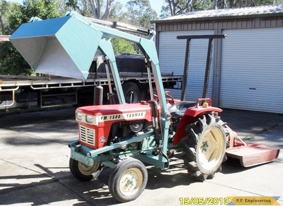 yanmar 1500 compact tractor loader raised bucket dumping