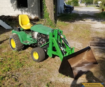 Ted L. Tarpon Springs, FL JD 425 Mini Payloader Bucket at rest