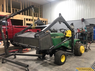 John Deere 420 loader bucket dump