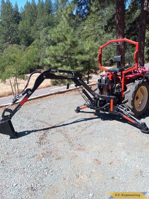 Eric L. West Point CA Micro Hoe reach on Yanmar diesel tractor